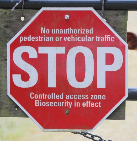 Stop sign - Controlled access zone - Biosecurity in effect