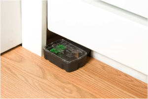 A mouse poison bait station inside a house