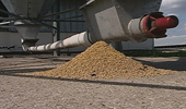 A pile of feed near equipment